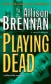 Playing dead a novel of suspense  Cover Image